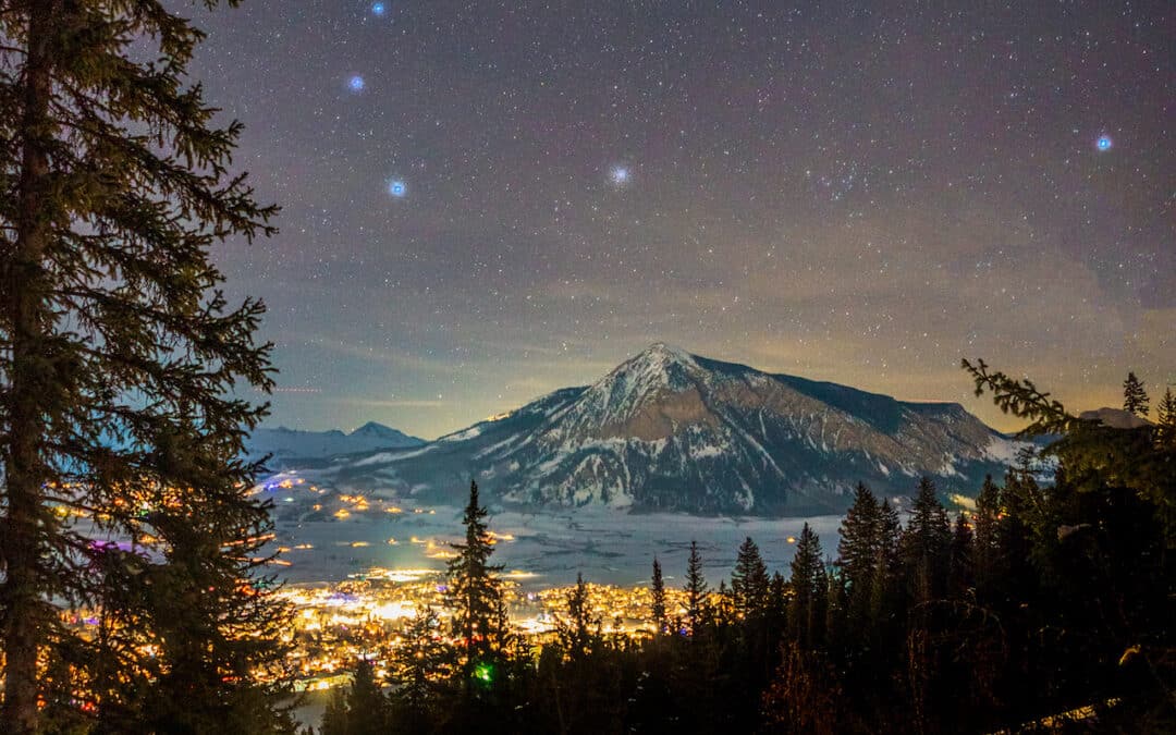 Crested Butte Real Estate - Starry night looking down at the town of Crested Butte
