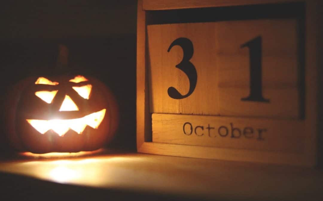 Crested Butte real estate - Jack O Lantern next to wooden calendar showing date of October 31