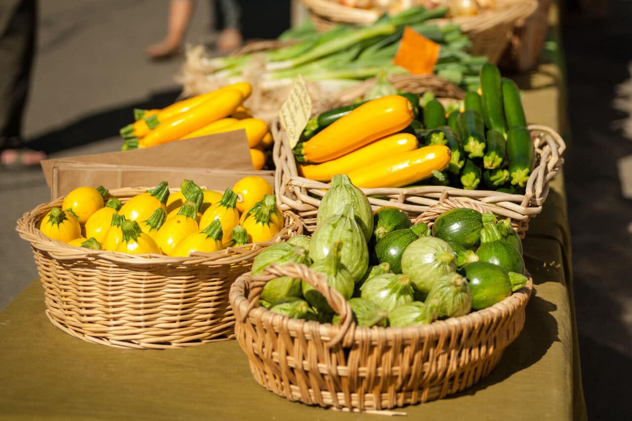 Crested Butte real estate - final days of the Crested Butte Farmers Market. Baskets of fall vegetables.