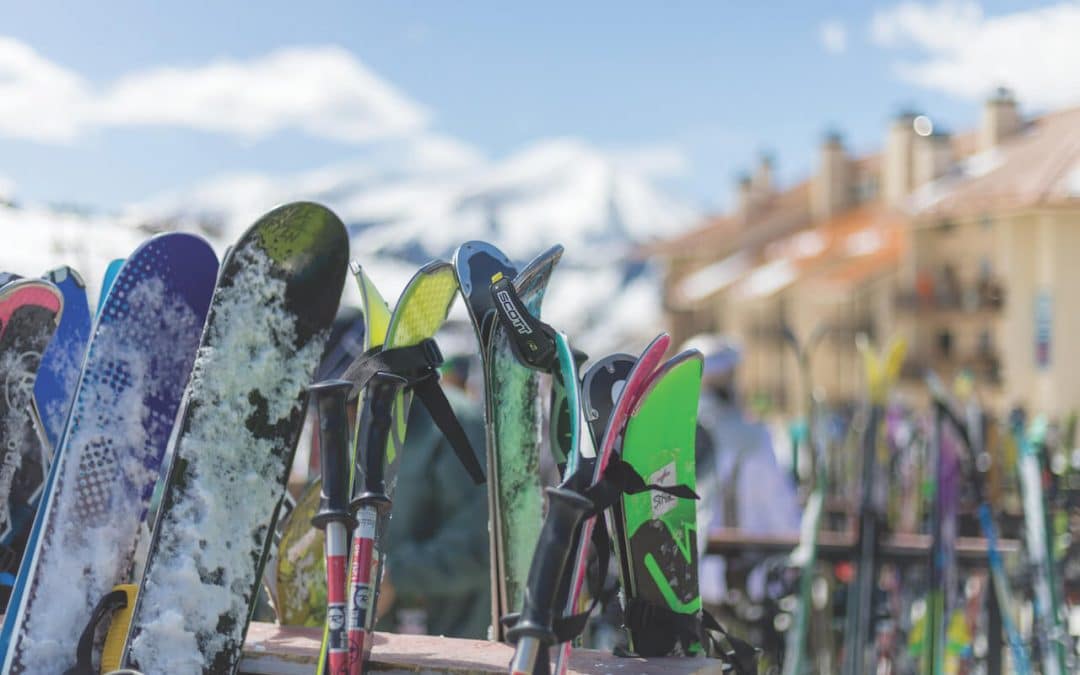 Crested Butte real estate - skis in the ski rack at the base area of Crested Butte Mountain Resort