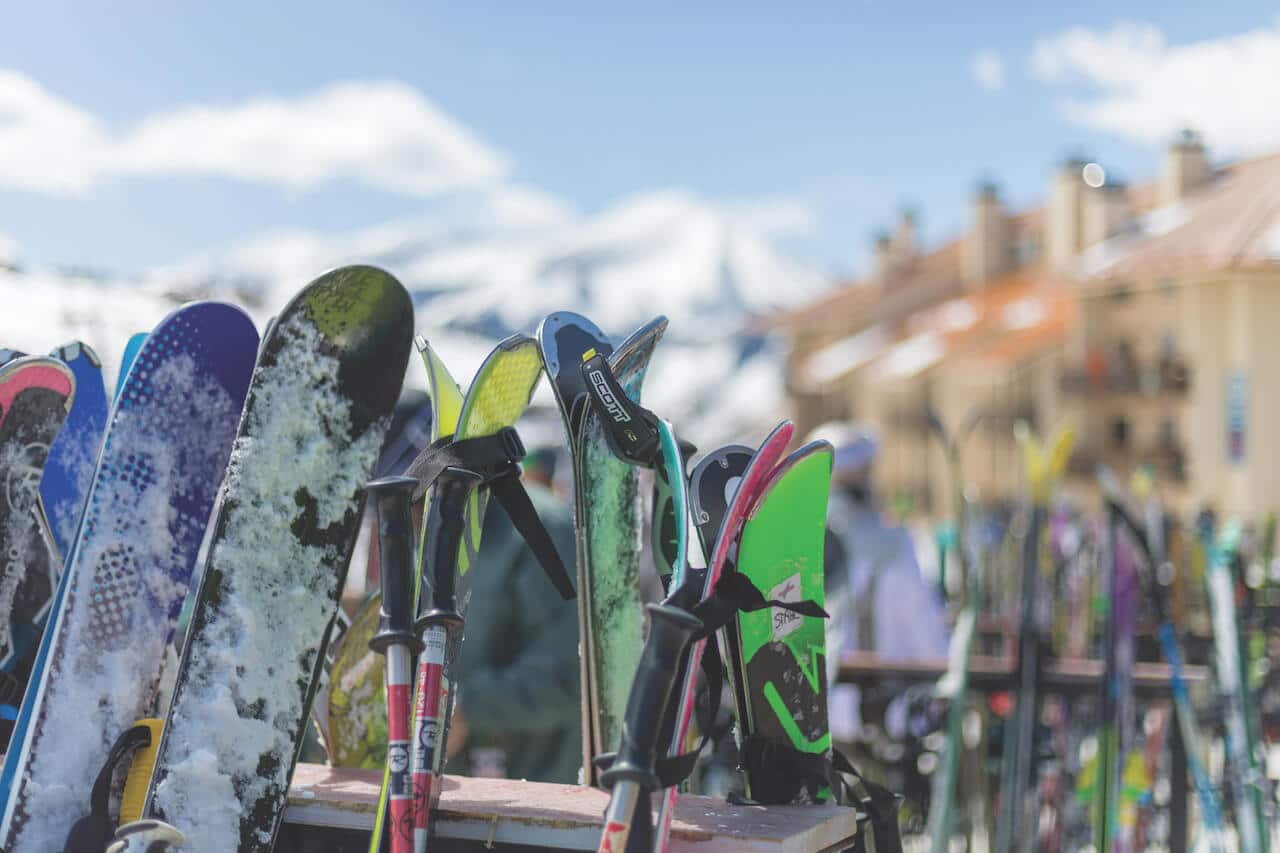 Crested Butte real estate - skis in the ski rack at the base area of Crested Butte Mountain Resort