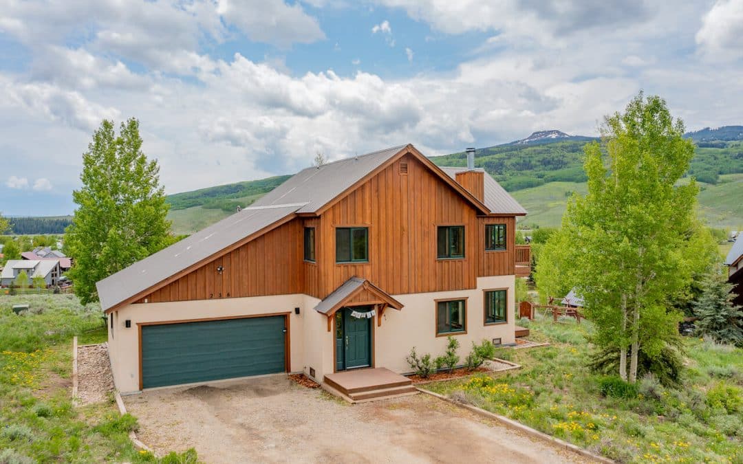 Crested Butte real estate agent Kiley Flint's new listing at 236 Goren Street, Crested Butte. Exterior image of two story home.